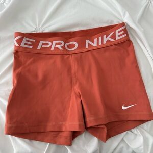 Nike Women's Orange Pro Shorts